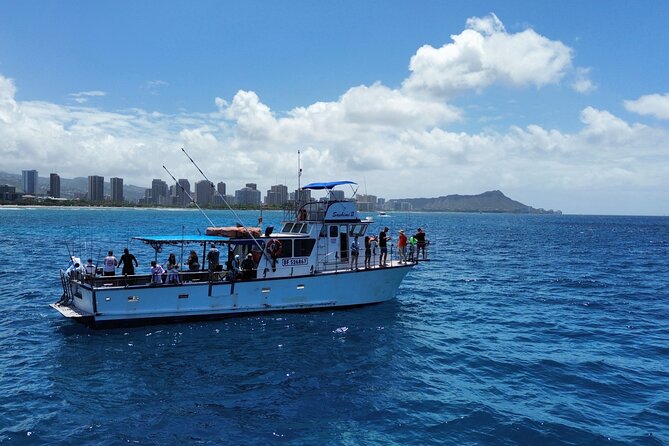 3-Hour Honolulu Bottom Fishing Adventure - Waikīkī views and ocean wildlife moments from the deck