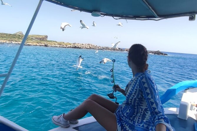 4 Hour Fishing and Swimming Boat Experience in Schisma Eloundas - Fishing on board: rods, bites, and a chance at real variety