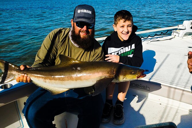 4 hour fishing Charter - Keep your eyes peeled for dolphins without falling off your game