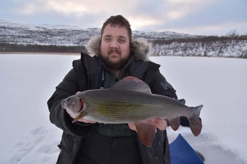 Abisko: Ice Fishing Experience - Ice fishing on a frozen lake in Abisko: what makes it special