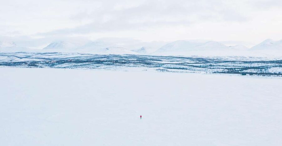 Abisko: Lake Torneträsk Arctic Ice Fishing Trip - Gear, warm clothing, and coaching that keeps things simple