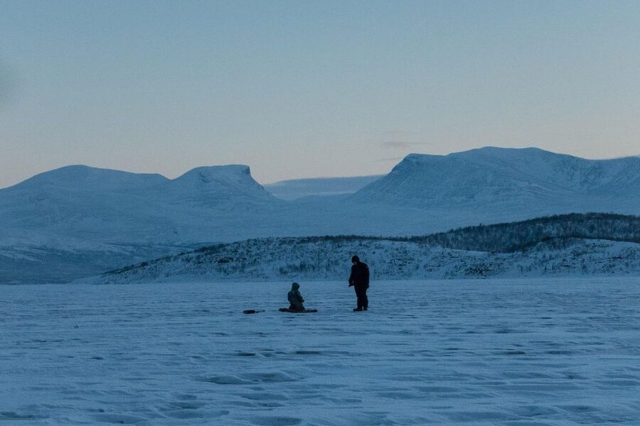 Abisko: Lake Torneträsk Arctic Ice Fishing Trip - Snowmobile ride and the moments that make it feel like Abisko