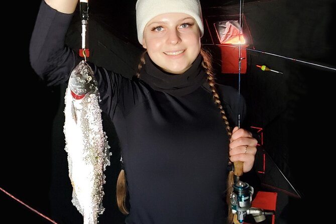 Anchorage Ice Fishing Adventure with transportation - The heated ice fishing tent: warmth, light, and comfort where it counts