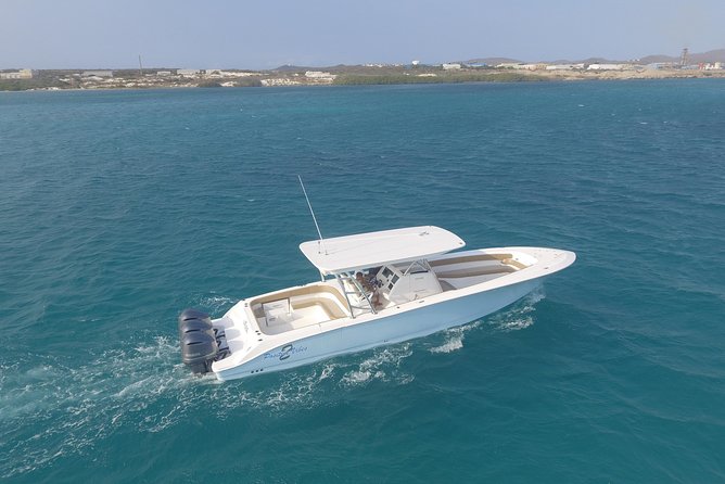 Aruba Private Luxury Boat Tours - Sail, Snorkel, Fishing and More - Tres Trapi Steps and Malmok Beach: coral-entry snorkeling plus calmer sand