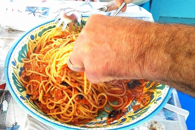 Capri Fishing Excursion with Snorkeling and Lunch from Sorrento - Lunch on Board: Spaghetti, Catch of the Day, and Real Local Flavor