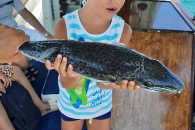 Captain Manolis Fishing with barbecue on the boat - 4.5 hours on the water: trolling, bottom fishing, then lunch