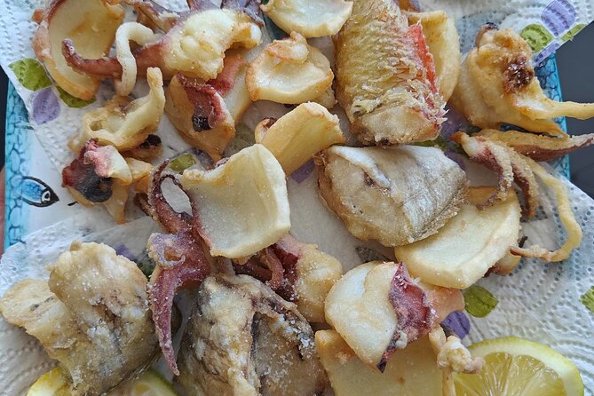 Cefalu: Boat Trip with Fishing, Coastal Tour and Lunch on Board - Lunch on Board: Fried Catch, Fish Pasta, and Local Drinks