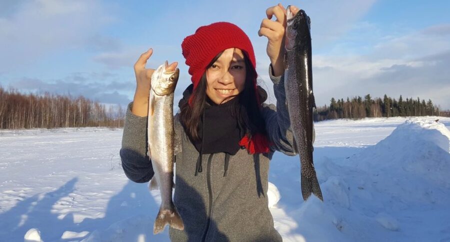 Chena Lake: Aurora Borealis Viewing & Ice Fishing Adventure - Inside the deluxe ice-fishing cabin: warm, practical, and built for fishing