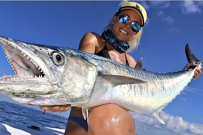 Deep Sea Fishing Dubai - Fishing Trip on Boat - The skyline cast: Burj Al Arab, Atlantis, and Ain Dubai from the sea