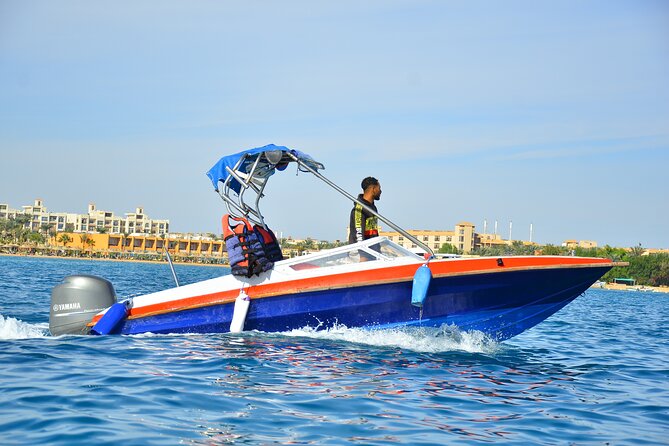 Fishing Private Speed Boat Sea Trip with Transfer - Hurghada - Getting in the water: the guided snorkeling stop and extra jump points