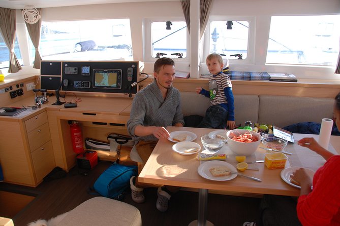 Fishing Trip with Luxury Catamaran in Tromso - Crew and vibe: friendly coaching matters in the cold