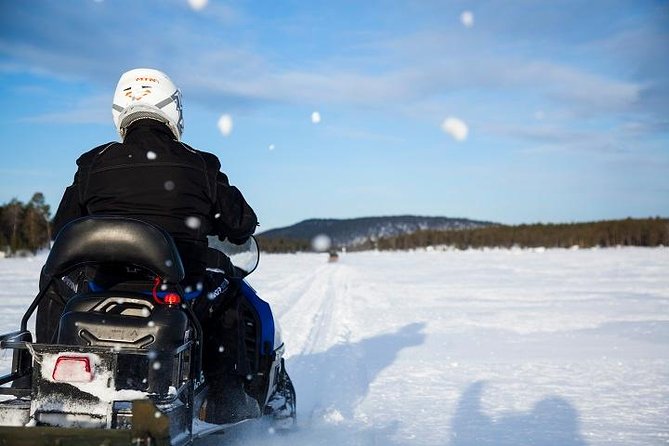 From Saariselkä: Ice Fishing Tour to Lake Inari, reindeers &lunch - Ice fishing on Lake Inari: learning the hole, watching for bites