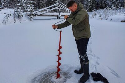 Half-Day Husky Safari and Salmon Ice Fishing Experience - Winter Clothes, Thermal Outwear, and Real Comfort