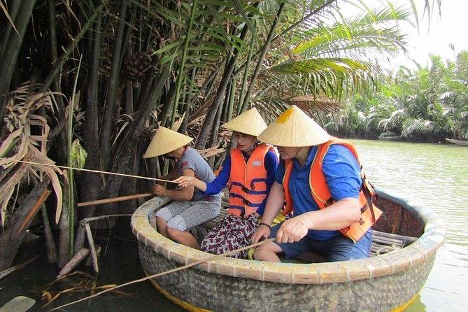 Hoi An Basket Boat Tour ( basket boat, visit water coconut forest, fishing crab) - The basket boat ride through Cam Thanh’s water coconut woods