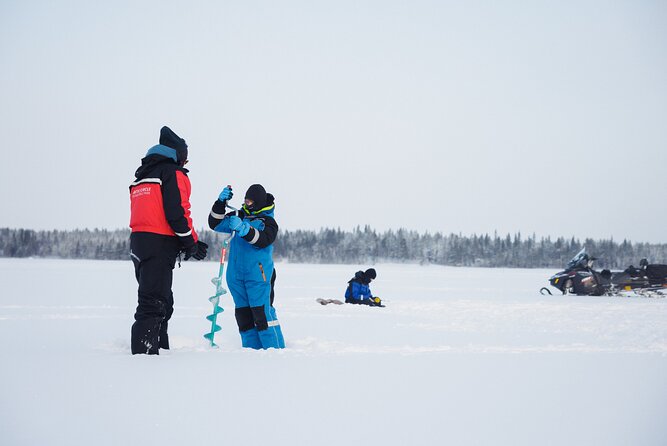 Ice Fishing and Snowmobile Safari Combo in Lapland - Campfire BBQ: warming up with sausages and fish stories