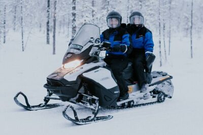 Ice Fishing by Snowmobile in Levi - Reaching the Frozen Lake: Drilling the Hole and Learning What to Do