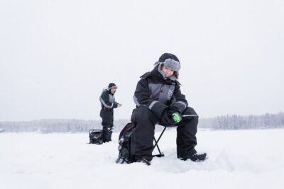 Ice Fishing on a Frozen Lake in Levi - Drilling the Ice and Trying to Catch Fish