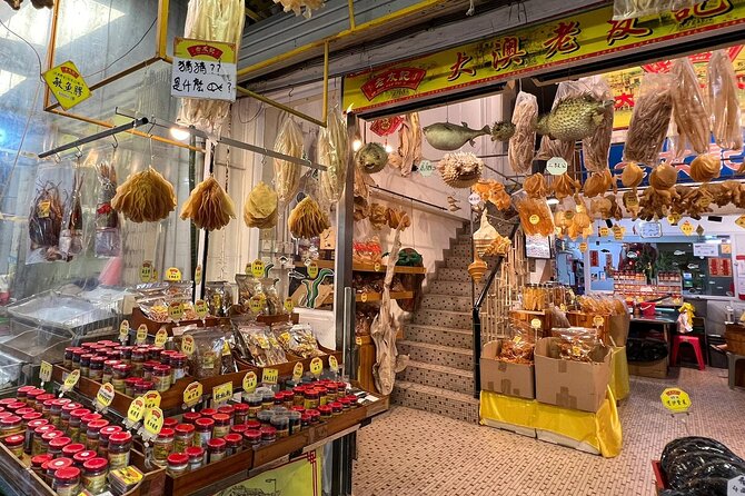 Lantau Group Tour: Dolphin Watching, Fishing Village & Cable Car - Tai O Fishing Village dolphin watching: Stilt houses, short cruise, and pink dolphin season
