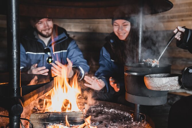 Lappish Lunch Break -Snowmobiling, ice fishing and tasty food - Snowmobile instructions and the two-person rhythm