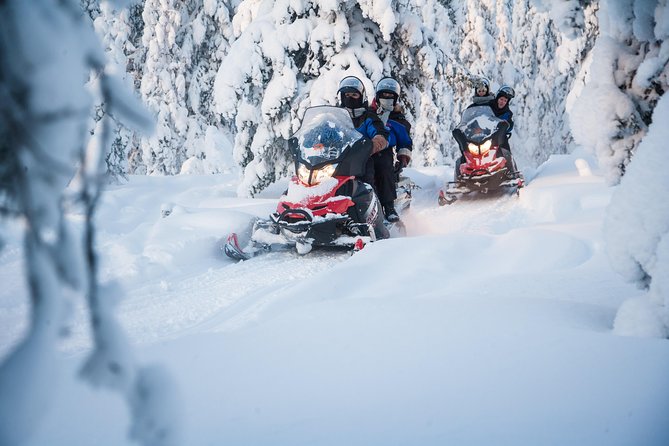 Lappish Lunch Break -Snowmobiling, ice fishing and tasty food - Riding over frozen rivers and Arctic tundra