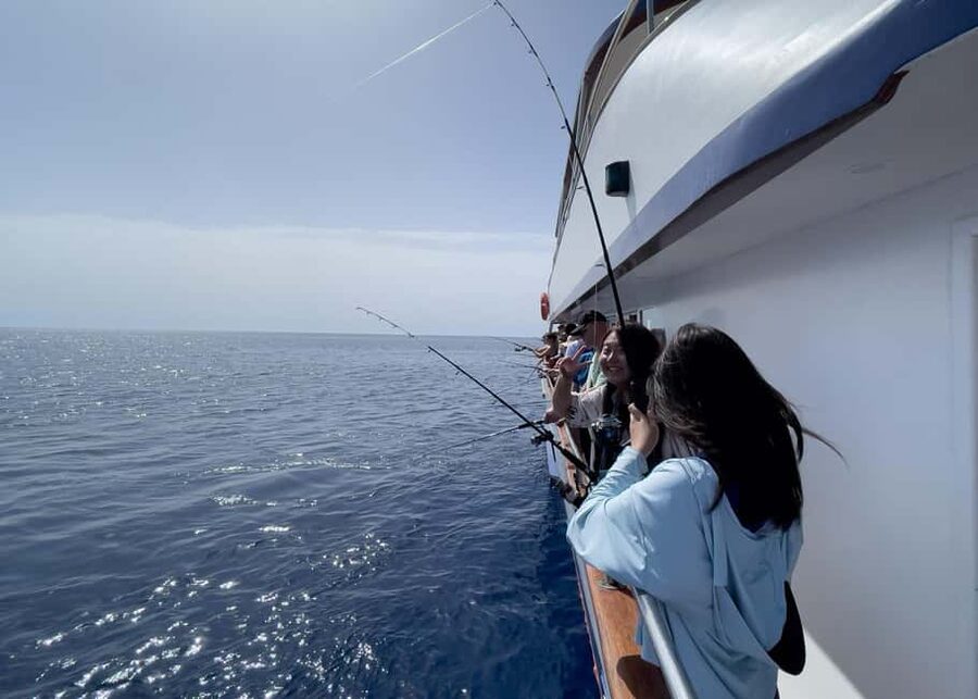 Larnaca: Glass-Bottom Boat Cruise with Fishing and BBQ Lunch - West Coast Views and Planes Overhead: The Quirky Larnaca Bonus