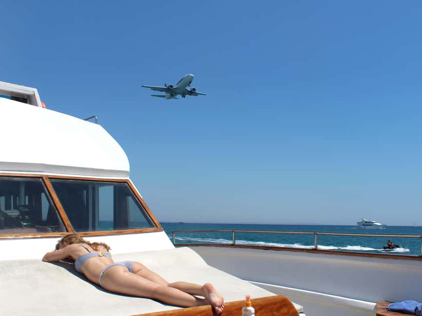 Larnaca: Glass-Bottom Boat Cruise with Fishing and BBQ Lunch - Your Guide and the Onboard Atmosphere