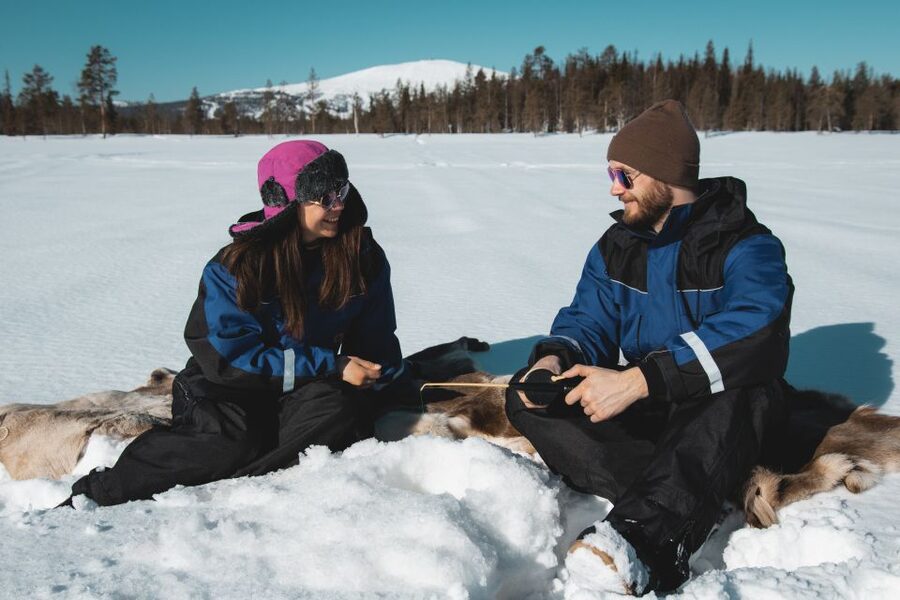 Levi: Finnish Ice Fishing Tour by Car - The warm break: campfire time and a hot drink on ice