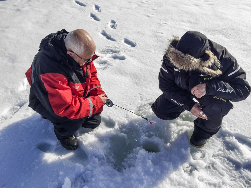 Levi: Ice Fishing by Snowmobile - Warm drink break and local fish stories: a reset you’ll appreciate