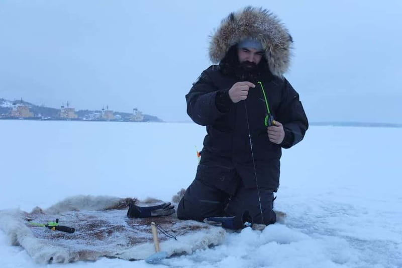 Lulea: Ice Fishing Tour in the heart of the city with Guide - Warm Reindeer Furs and Hot Beverages While You Wait