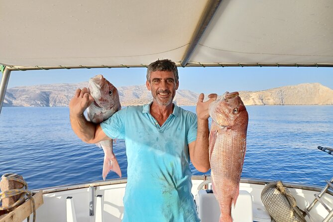 Naxos private fishing trips, lunch on board & island hopping - The swimming break: caves and “hidden” coastline time