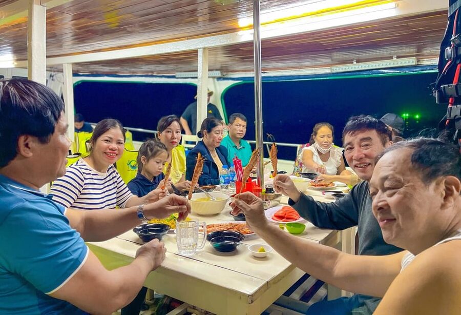 Phu Quoc: Sunset and Squid Fishing Boat Tour with Dinner - What to bring for a comfortable night on the water