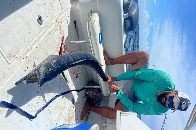 Private Deep Sea Fishing Experience in Grand Cayman - Getting off the dock: Camana Bay Marina to open water
