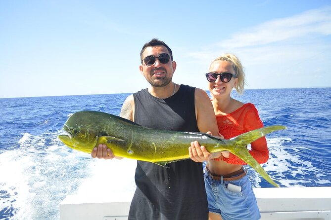 Private Fishing Charter Punta Cana (Orion) - On-board comfort: open bar, sandwiches, tropical fruit, and ceviche