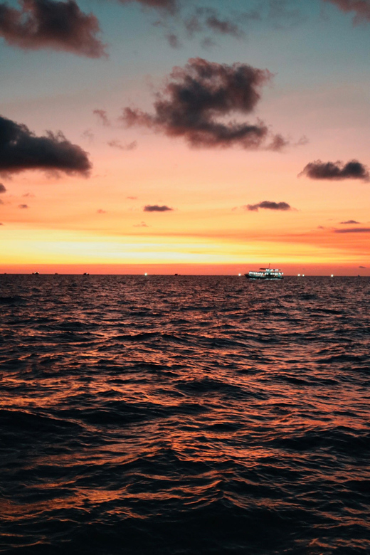 RedRiverTours - Enjoying Sunset & Night Squid Fishing - Fishing Gear + Dinner On Board: The Part That Makes It Feel Worth It