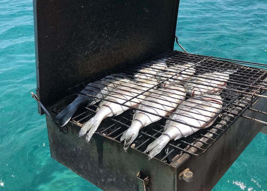 Rhodes: Fishing Boat Trip (Small Group, Food & Drinks incl.) - Lunch Onboard: Grilled Fish With Drinks Included