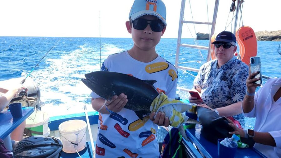 Rhodes: Fishing Trip, Snorkelling, BBQ, & Professional Guide - Trolling for Predator Fish with Pro Equipment
