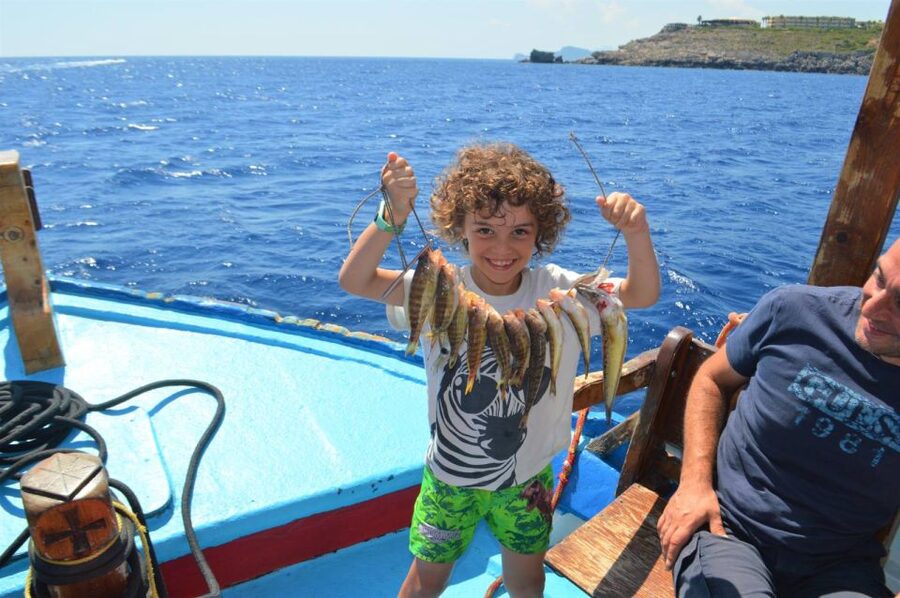 Rhodes Town: Fishing Boat Trip with Fish Meal and Swim Stops - Rhodes Town, but from the water: why this trip feels different