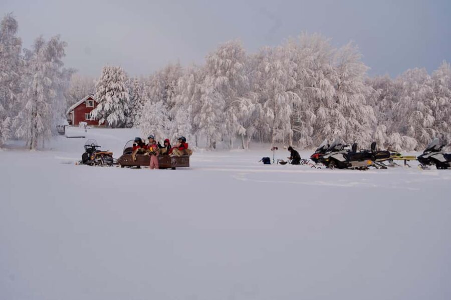 Rovaniemi: Ice Fishing and Snowmobile Tour with Snacks - Key highlights at a glance