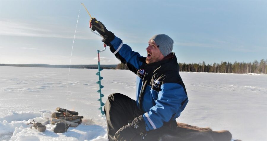 Rovaniemi: Ice-Fishing like a Finn - Drilling Through the Ice: Your First Finnish Ice-Fishing Lesson