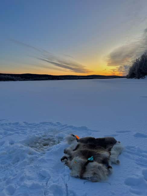 Rovaniemi: Ice Fishing The Finnish Way - Getting set up on the frozen Ounasjoki River
