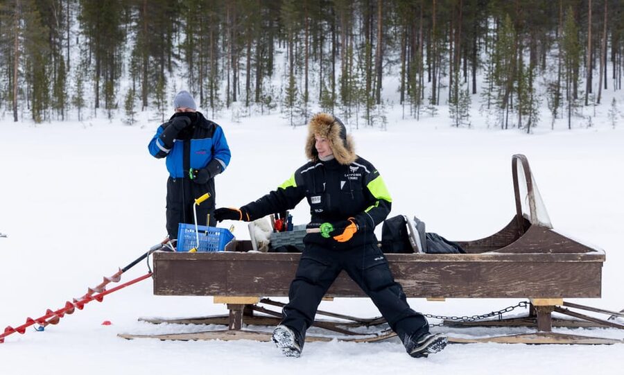 Saariselkä: Ice Fishing Safari by Snowmobile - Snowmobile driving through forests and open fells