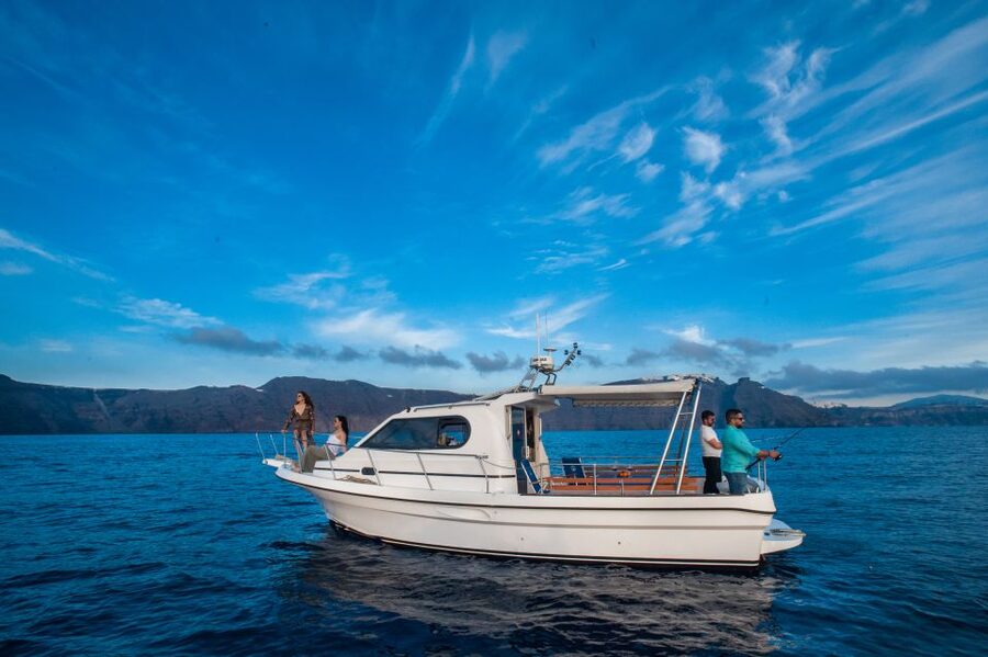 Santorini Private Cruise boat fishing tour - BBQ, Snorkeling - Viewing Oia sunset from the water: better angles than shore crowds