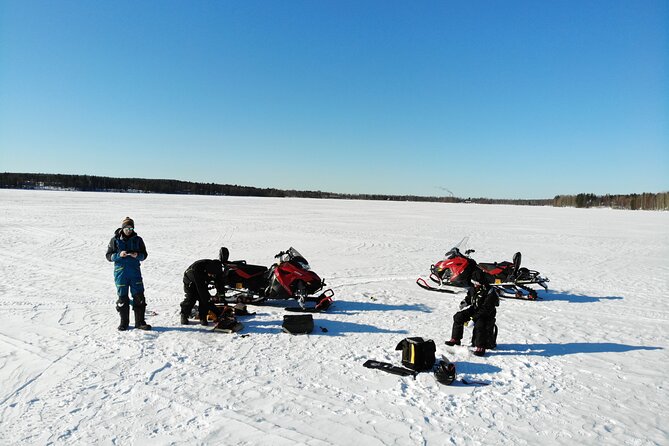 Snowmobile and Ice Fishing Excursion (private tour) - The snowmobile portion: frozen river and snowy forest time