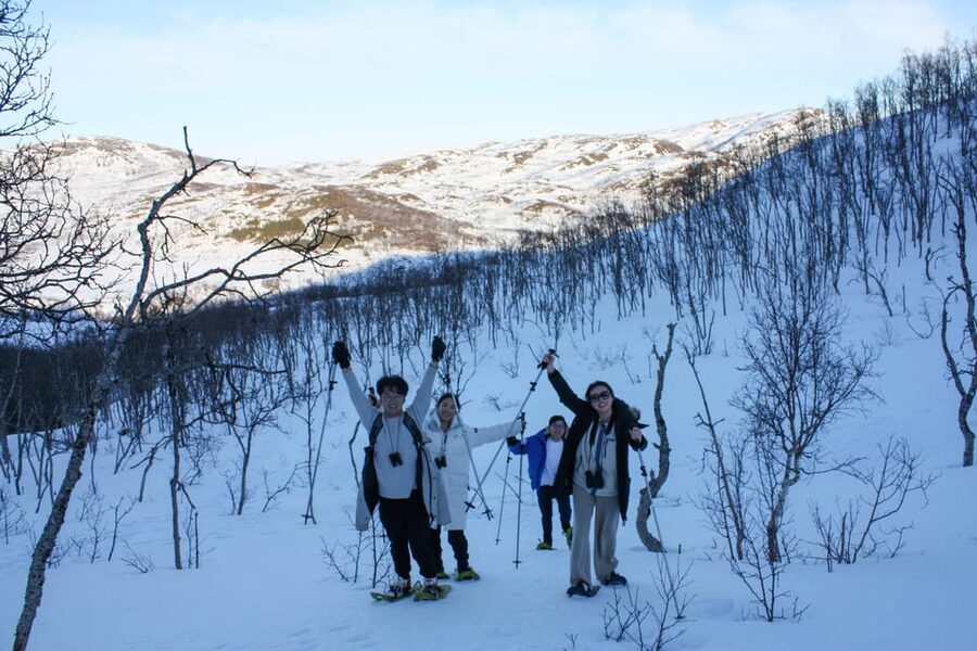 Tromsø: Ice Fishing and Snowshoe Hiking with a Local Guide - From Tromsø city center to a frozen lake you can feel