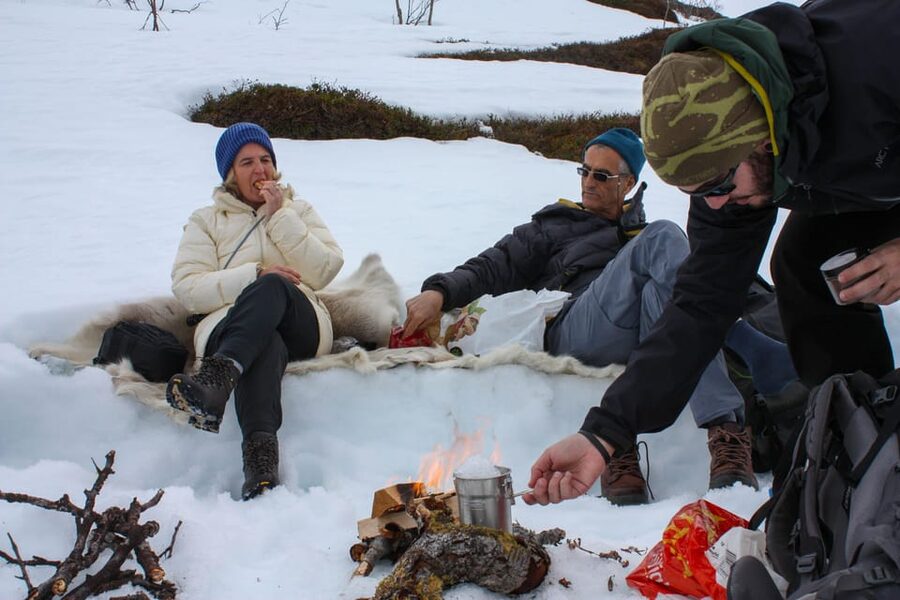 Tromsø: Ice Fishing and Snowshoe Hiking with a Local Guide - Ice fishing camp: drilling through thick ice and waiting like a pro