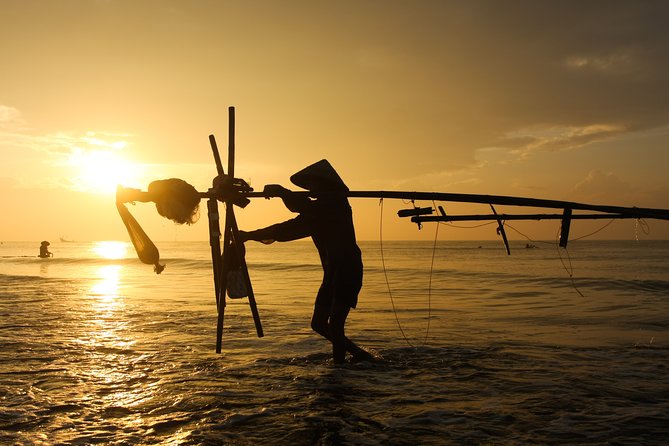 Vietnam Fishing village photography tours - Hundreds of meters of net and men on stilts