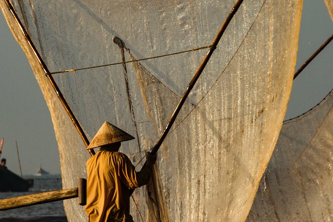 Vietnam Fishing village photography tours - Salt-making and fishing tools: turn chores into photo essays