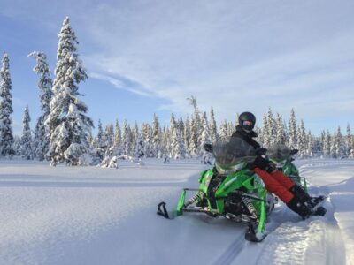 Wilderness Tour with Snowmobile & Ice Fishing - Safety briefing first: learning to drive widetrack snowmobiles