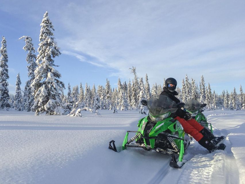 Wilderness Tour with Snowmobile & Ice Fishing - Safety briefing first: learning to drive widetrack snowmobiles
